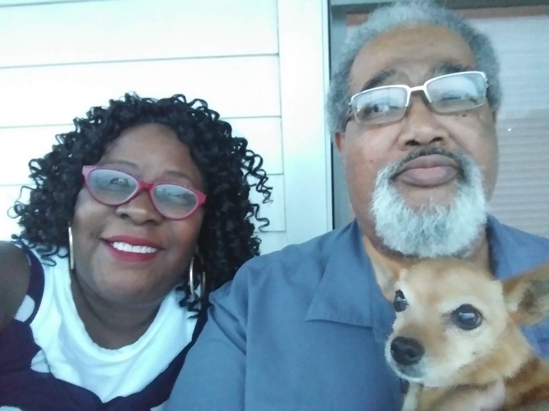 Kim, Mark, and their dog.